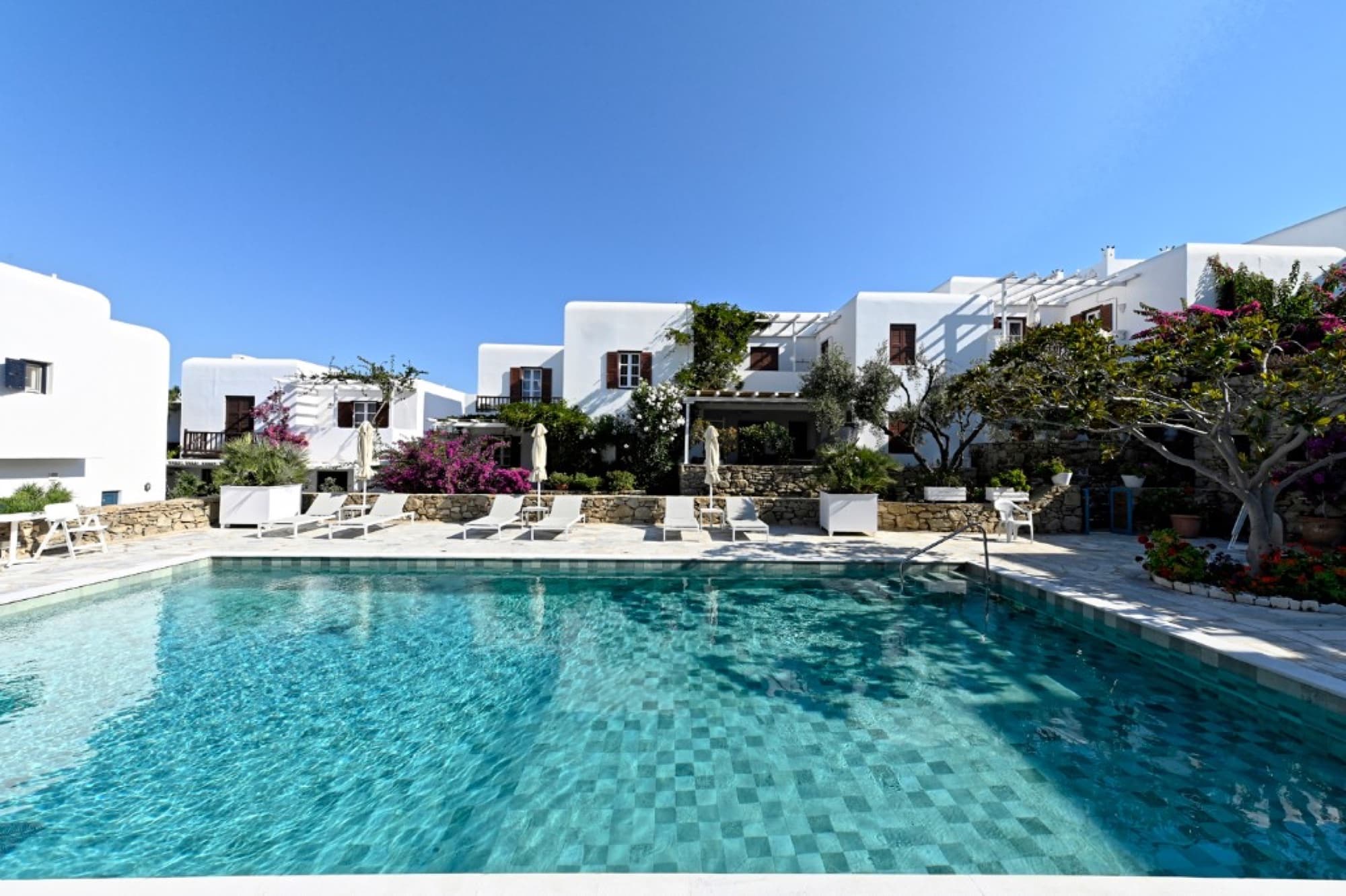 Shared pool and courtyard at Hedoni